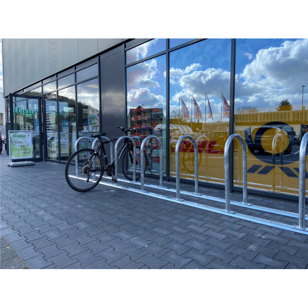 Bicycle rack - row arrangement | lean-on hoop made of steel tube 60 x 60 mm | hot-dip galvanized | for 3 bicycles
